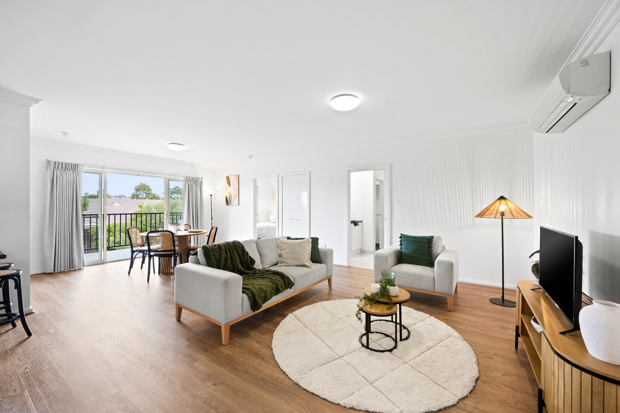 A living room with balcony.